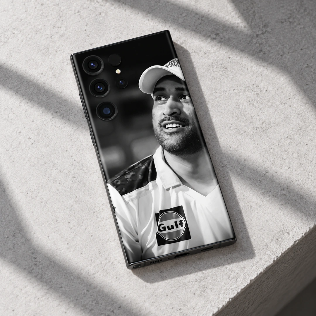 MS Dhoni Black and White Portrait Mobile Skin – Stone ledge detail MS Dhoni Black and White Portrait Mobile Skin, stone ledge detail showing the original smiling portrait and cap