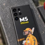 Close detail of the Dhoni portrait and yellow jersey on the mobile skin