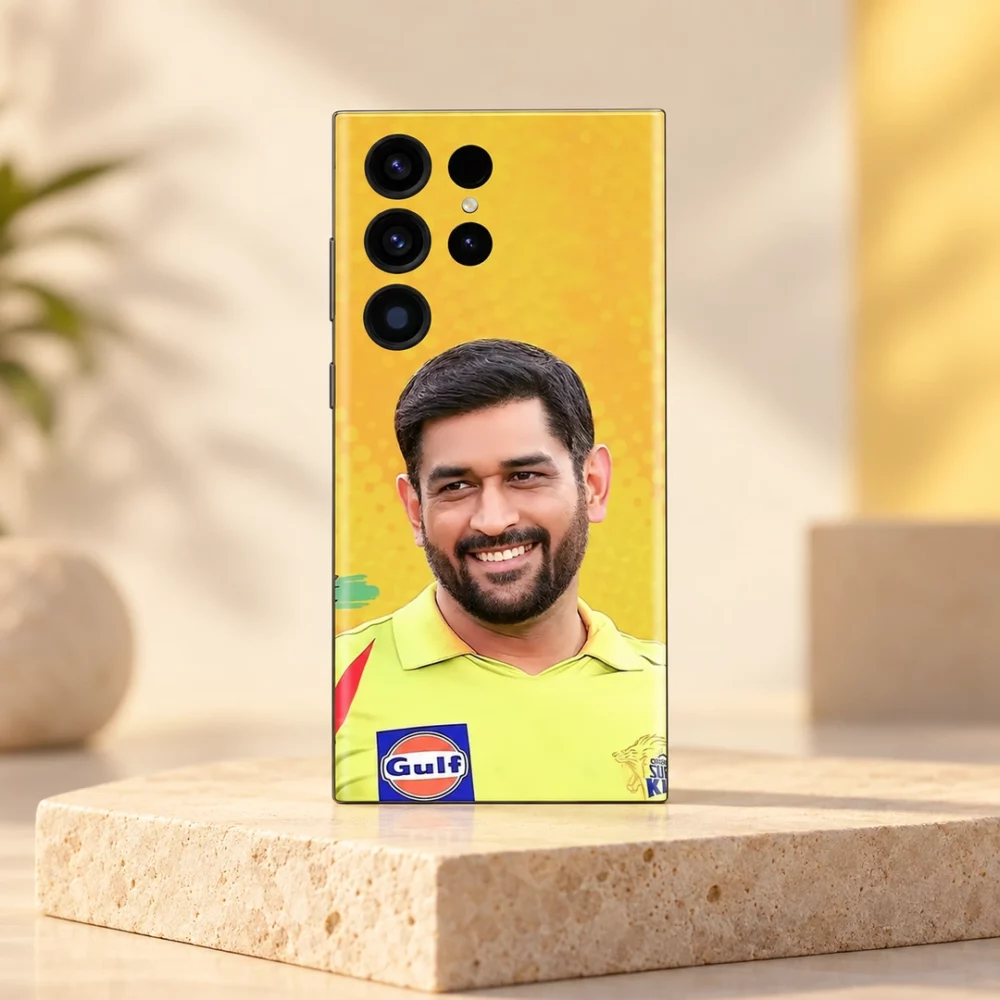 MS Dhoni photo mobile skin with smiling portrait and yellow jersey, sandstone studio hero