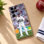 MS Dhoni wicketkeeper photo mobile skin in white Test cricket uniform, cricket desk flat lay
