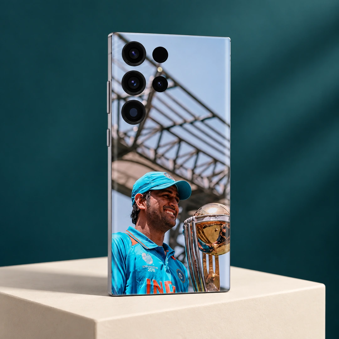 MS Dhoni Trophy Photo Mobile Skin – Teal studio angle MS Dhoni trophy photo mobile skin with blue jersey and cap, teal studio angle