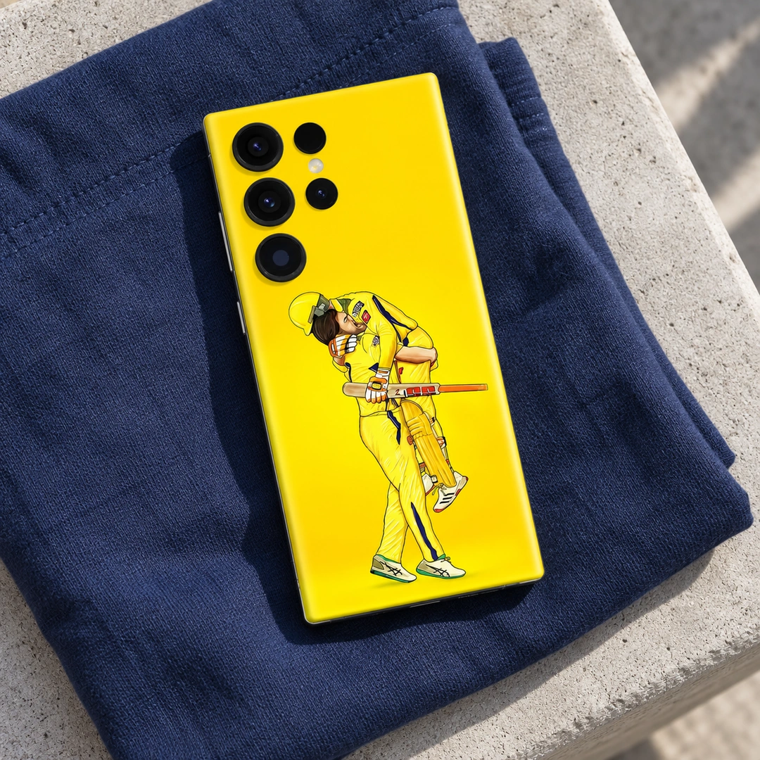 MS Dhoni Yellow Celebration Mobile Skin - Navy fabric lifestyle Yellow MS Dhoni celebration mobile skin showing two cricket players embracing, navy fabric lifestyle