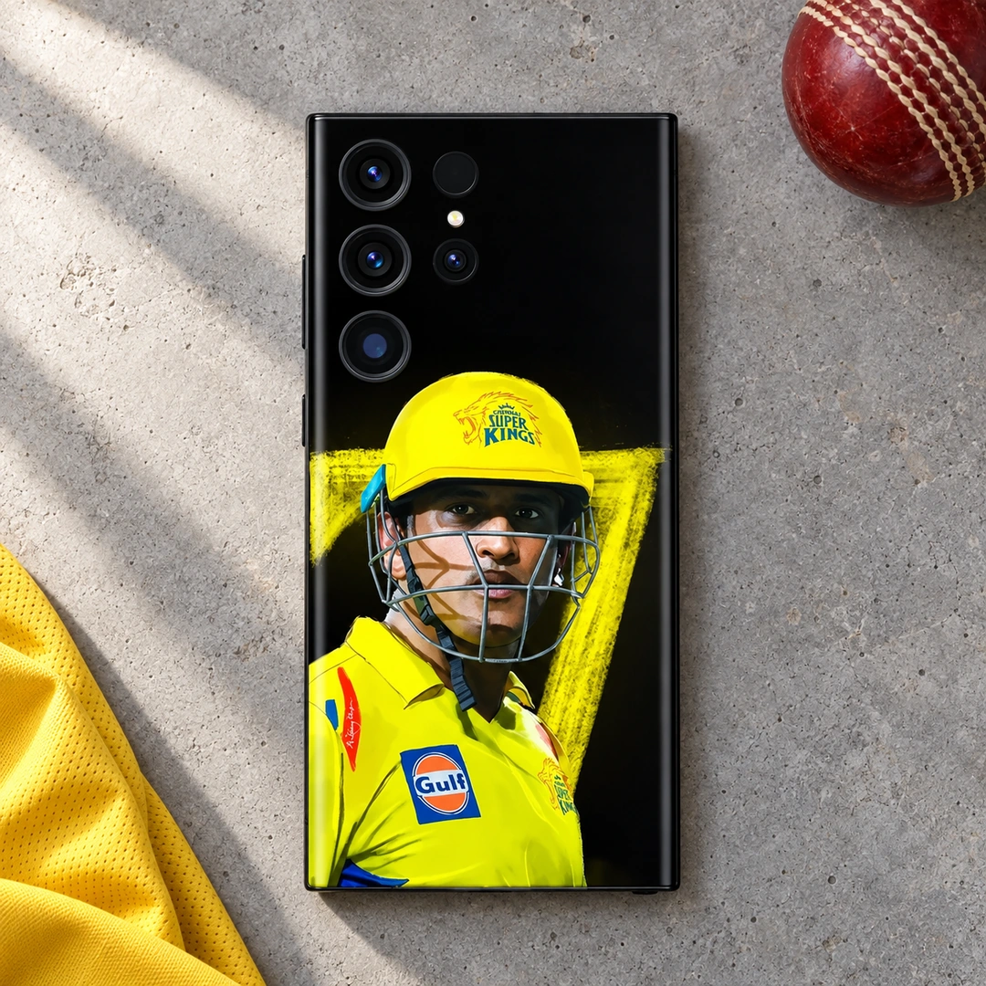 MS Dhoni Yellow Helmet Photo Mobile Skin – Cricket desk flat lay MS Dhoni phone skin with yellow helmet portrait and number 7 on black, cricket desk flat lay