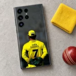 MS Dhoni photo mobile skin with yellow number 7 jersey, cricket accessories flat lay