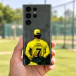 MS Dhoni photo mobile skin with yellow number 7 jersey, handheld at cricket practice ground