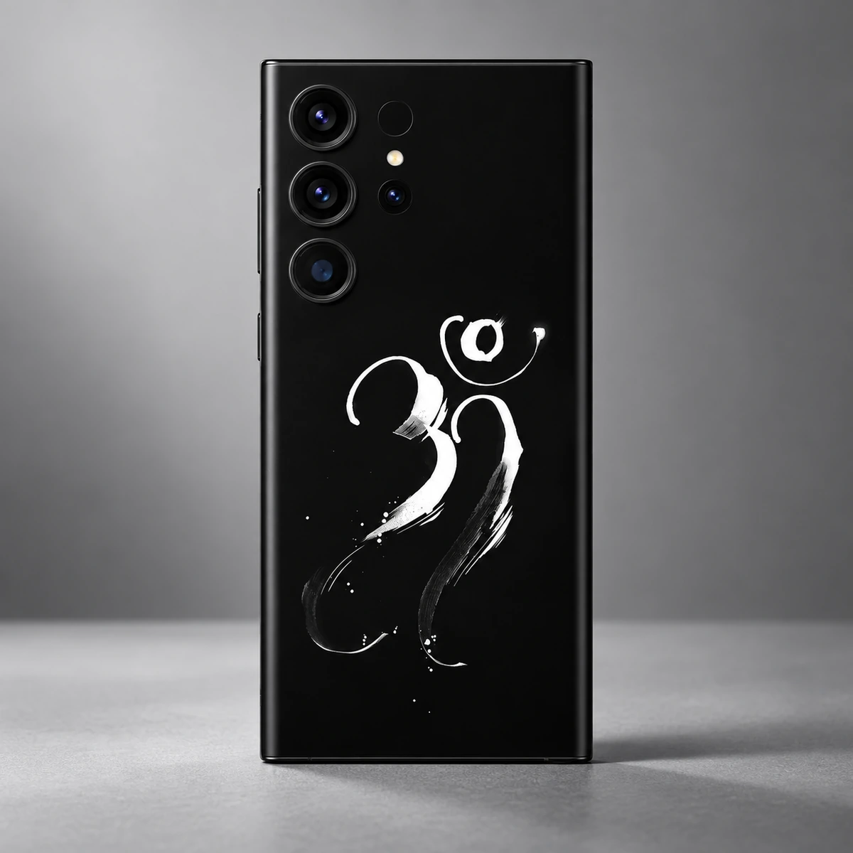 Om Mahadev White Calligraphy Mobile Skin - Brushstroke detail Close detail of white Om calligraphy tapered brushstrokes and ink speckles on black mobile skin