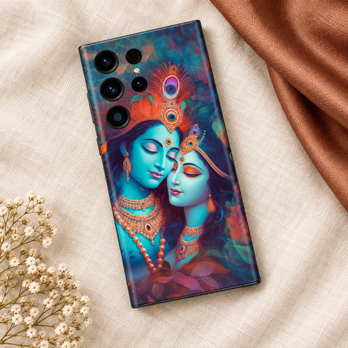 Radhe Krishna Teal Portrait Mobile Skin - Linen flatlay Radhe Krishna Painting mobile skin with teal portraits and gold jewellery - linen flatlay