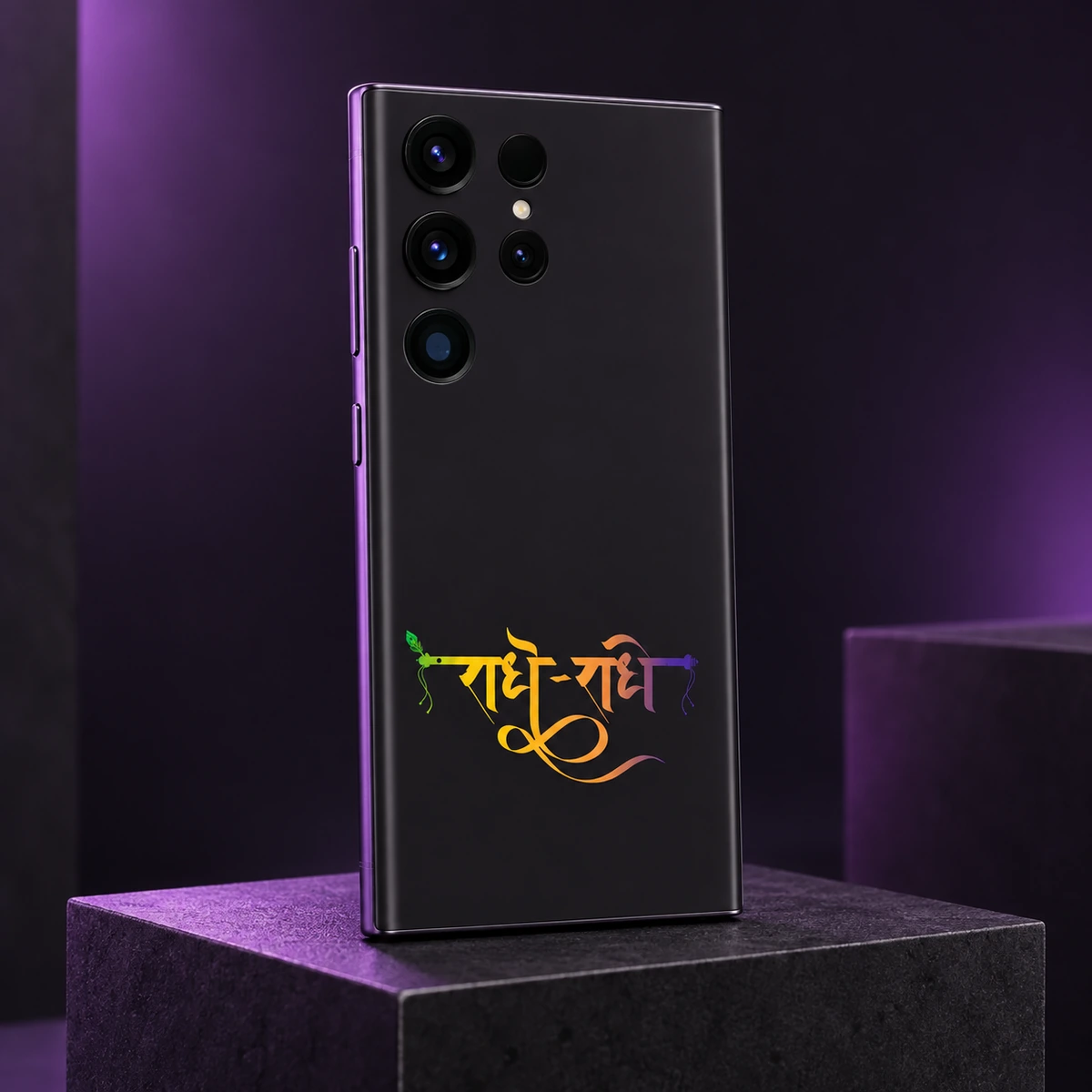 Radhe Radhe Gradient Calligraphy Mobile Skin - Purple studio angle Radhe Radhe mobile skin with gradient Hindi calligraphy on charcoal black, purple studio angle
