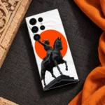 Chhatrapati Shivaji Maharaj horse statue mobile skin with orange circle and white paper print, saffron flat lay