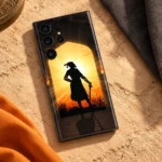 Shivaji Maharaj sunrise silhouette mobile skin – sandstone flat lay