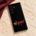 Red and gold Krishna calligraphy mobile skin on travertine with burgundy linen