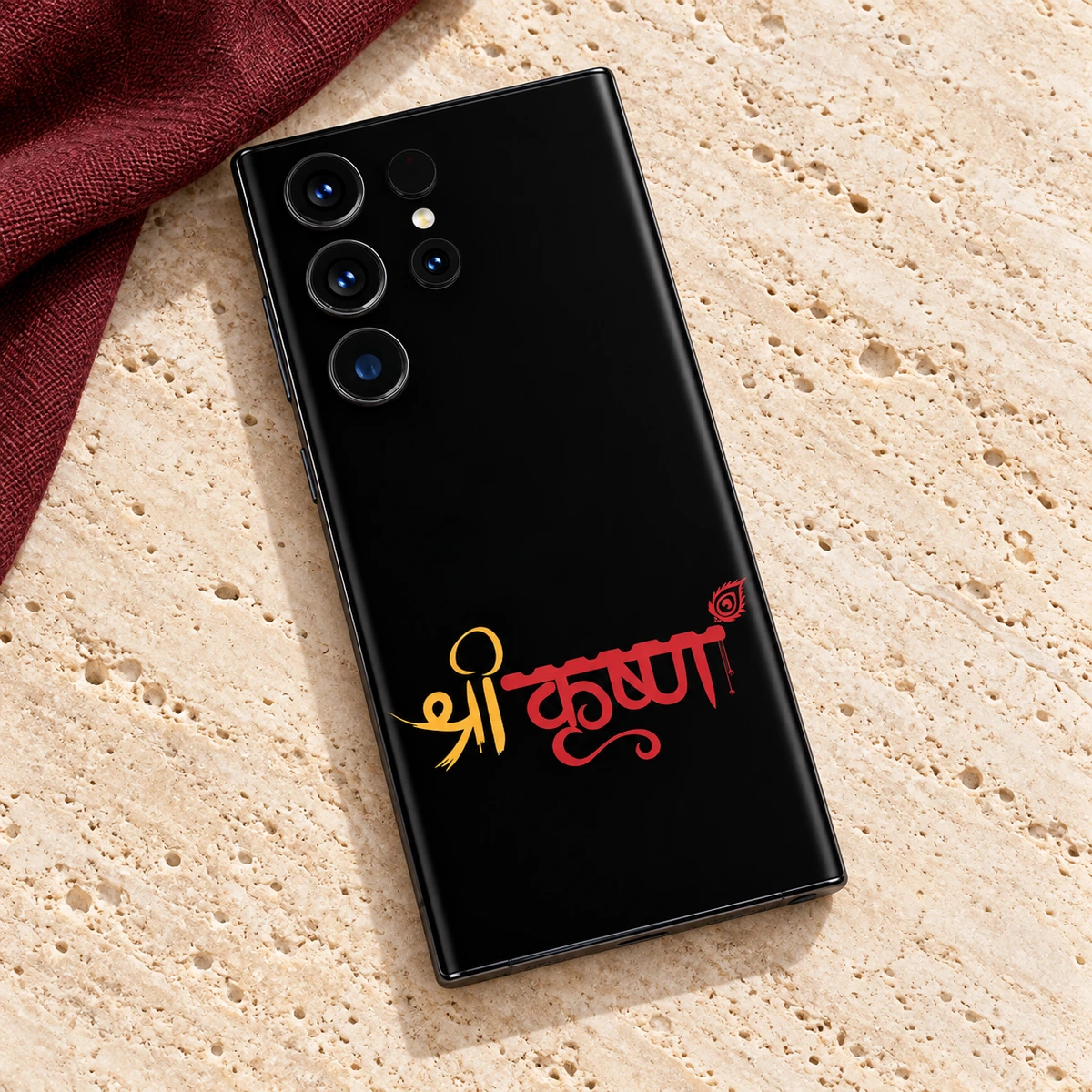 Shree Krishna Red Gold Script Mobile Skin - Linen Flatlay Red and gold Krishna calligraphy mobile skin on travertine with burgundy linen