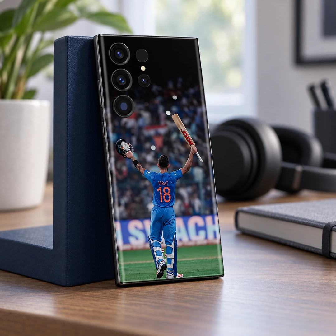 Virat Kohli 18 Bat and Helmet Celebration Mobile Skin – Fan desk view Virat Kohli 18 Bat and Helmet Celebration Mobile Skin, fan desk view showing VIRAT 18 with bat and helmet raised