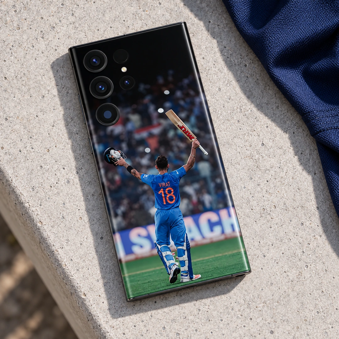 Virat Kohli 18 Bat and Helmet Celebration Mobile Skin – Concrete bench view Virat Kohli 18 Bat and Helmet Celebration Mobile Skin, concrete bench view showing VIRAT 18 with bat and helmet raised
