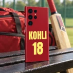 Red Virat Kohli mobile skin with bold yellow KOHLI 18 lettering, pavilion bench