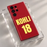 Red Virat Kohli mobile skin with bold yellow KOHLI 18 lettering, angled studio view