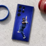 Virat Kohli batting photo mobile skin on royal blue, cricket accessories flat lay