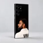 Virat Kohli black portrait mobile skin shown at a slight rear angle against a gray studio background