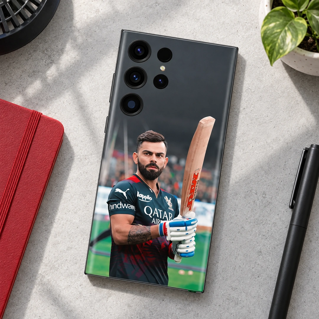 Virat Kohli Bat Portrait Mobile Skin - concrete desk flat lay Virat Kohli photo mobile skin showing bat portrait in black-and-red cricket jersey, concrete desk flat lay