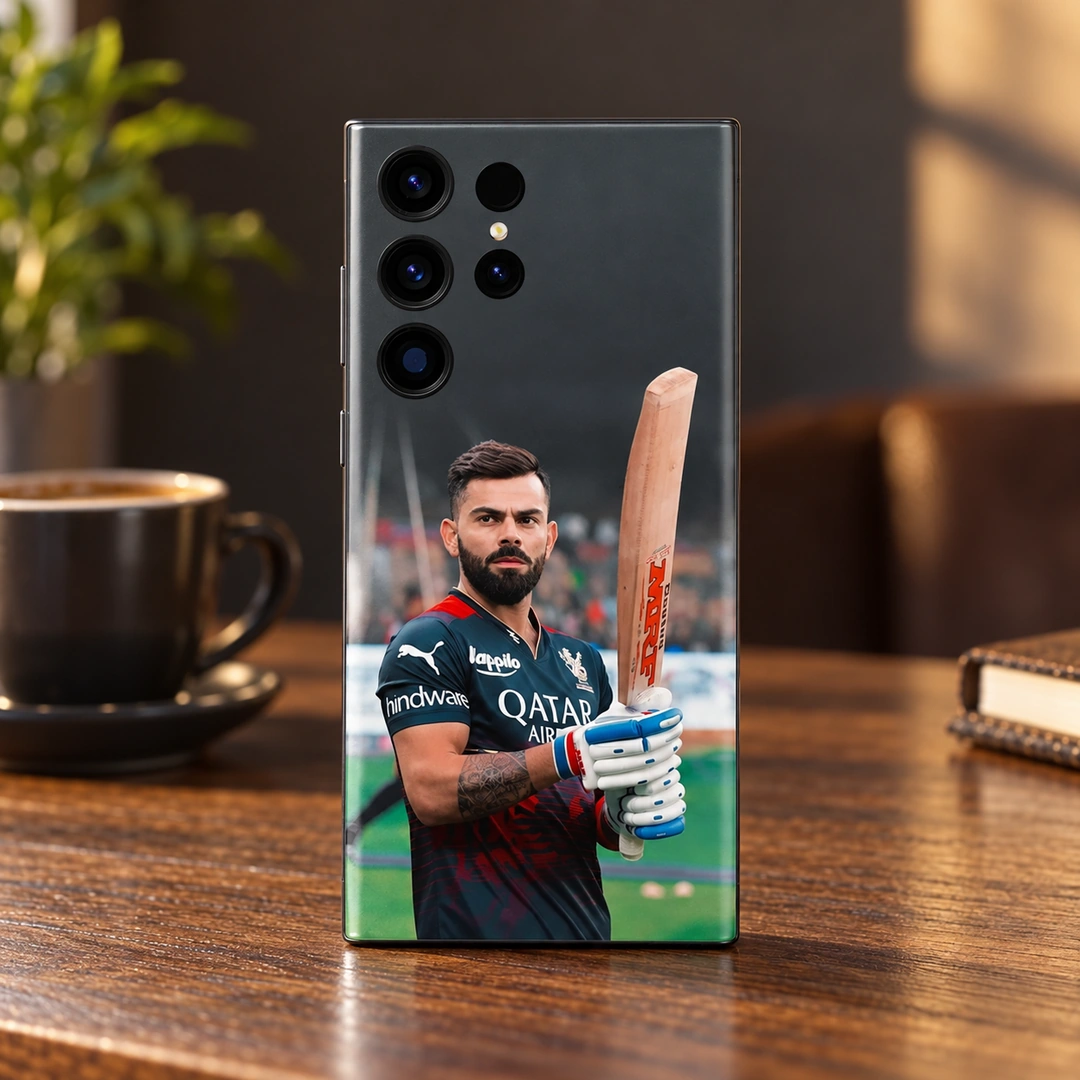 Virat Kohli Bat Portrait Mobile Skin - warm cafe table Virat Kohli photo mobile skin showing bat portrait in black-and-red cricket jersey, warm cafe table