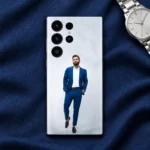 Virat Kohli blue suit mobile skin on navy fabric beside a watch