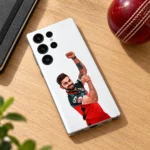 Virat Kohli photo mobile skin with raised-fist celebration on white, cricket desk flat lay