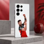 Virat Kohli photo mobile skin with raised-fist celebration on white, red studio angle
