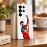 Virat Kohli photo mobile skin with raised-fist celebration on white, cafe lifestyle