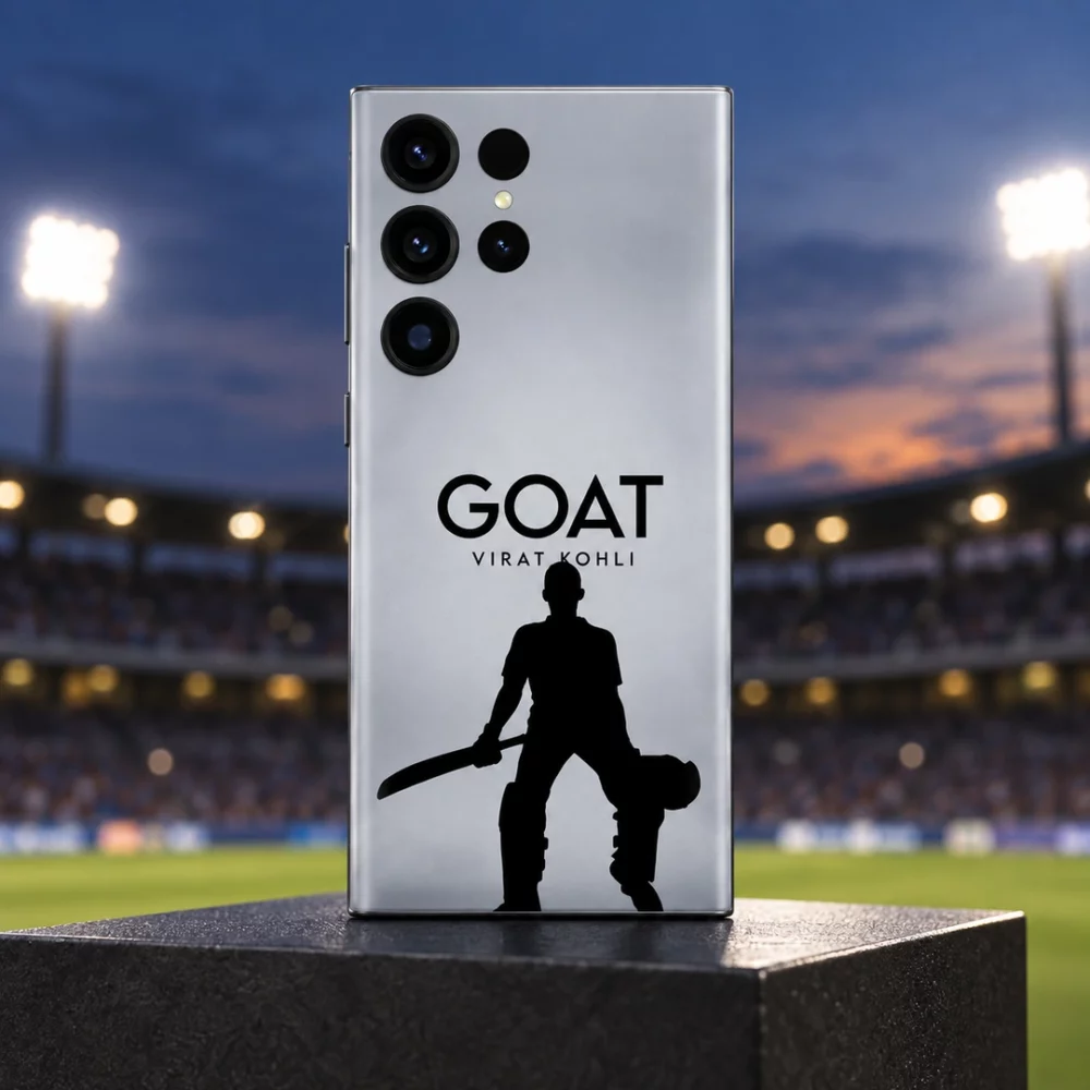 Silver-gray Virat Kohli GOAT mobile skin with black cricketer silhouette, stadium dusk hero