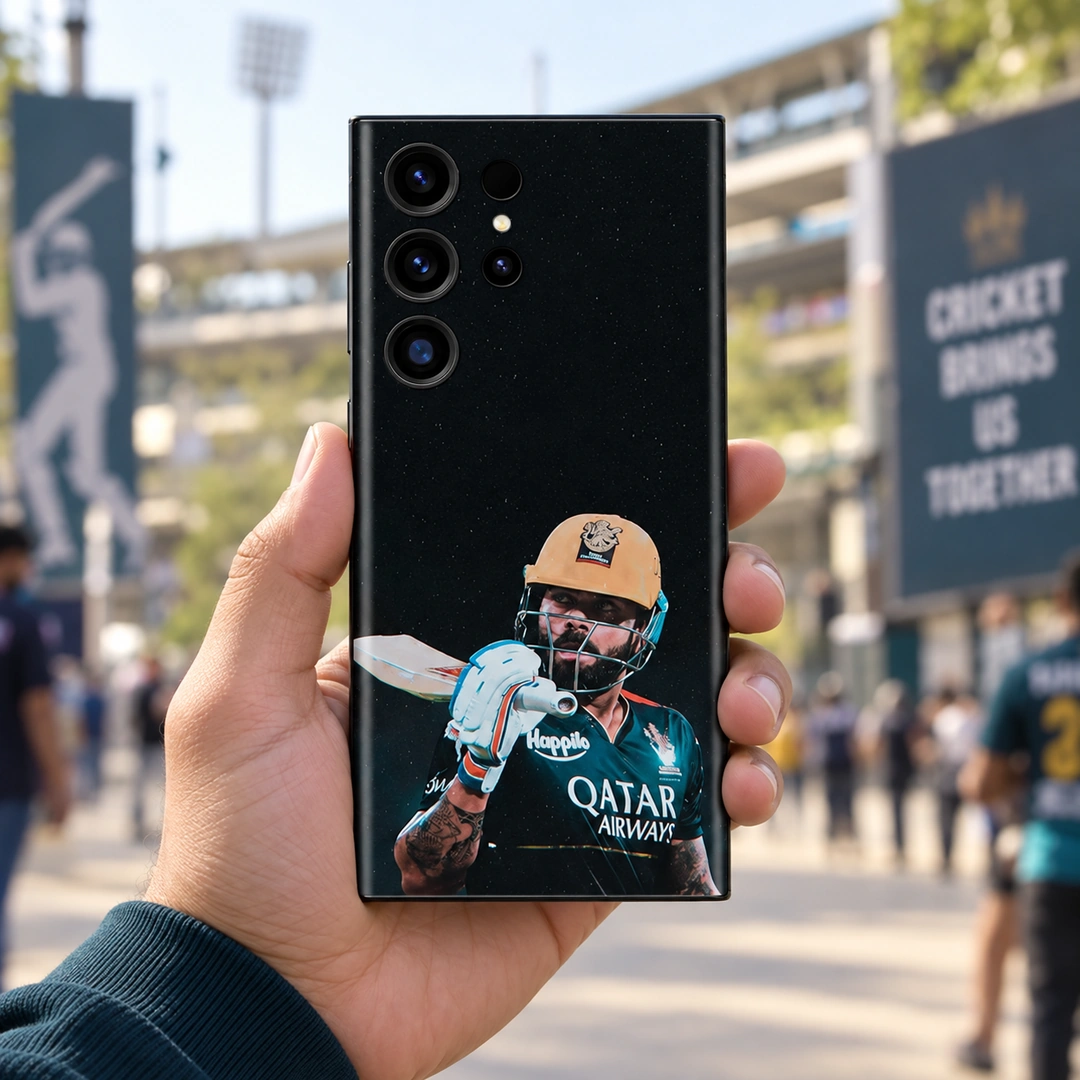 Virat Kohli Gold Helmet Mobile Skin - Cricket Ground Lifestyle Virat Kohli mobile skin with gold helmet and bat portrait on black, cricket ground lifestyle