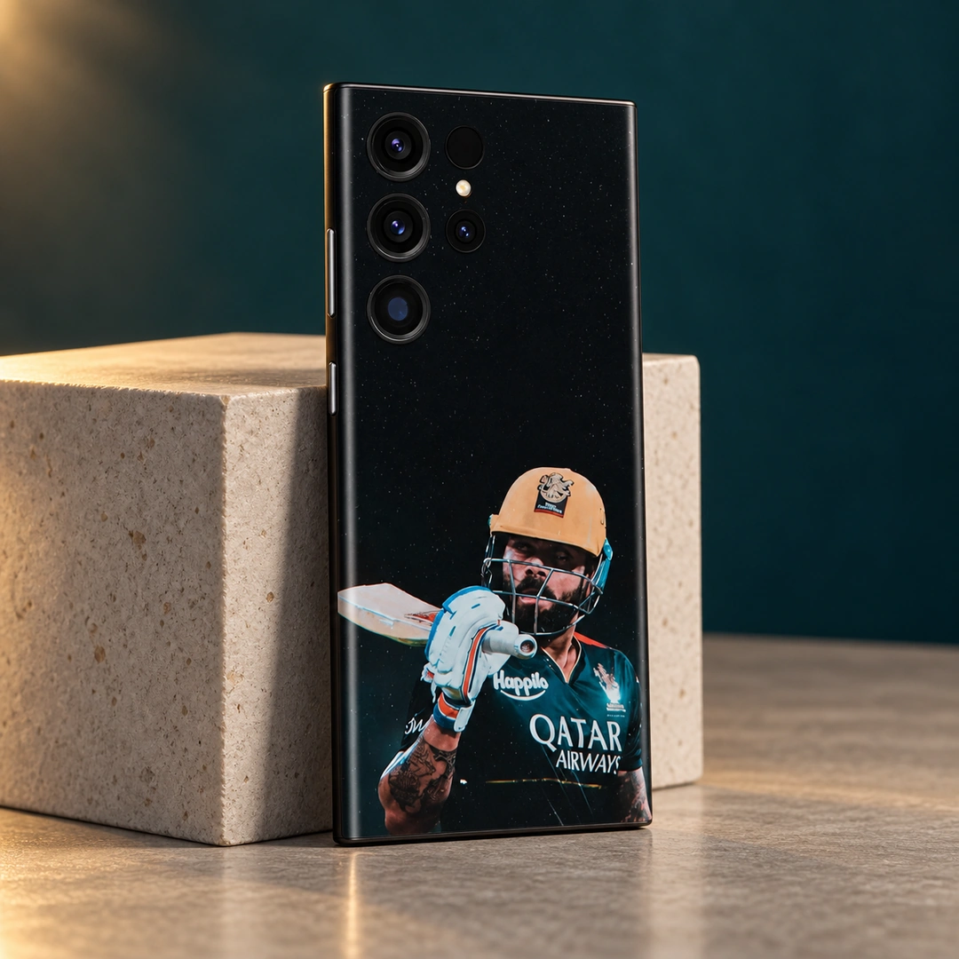 Virat Kohli Gold Helmet Mobile Skin - Stone Studio Angle Virat Kohli mobile skin with gold helmet and bat portrait on black, stone studio angle