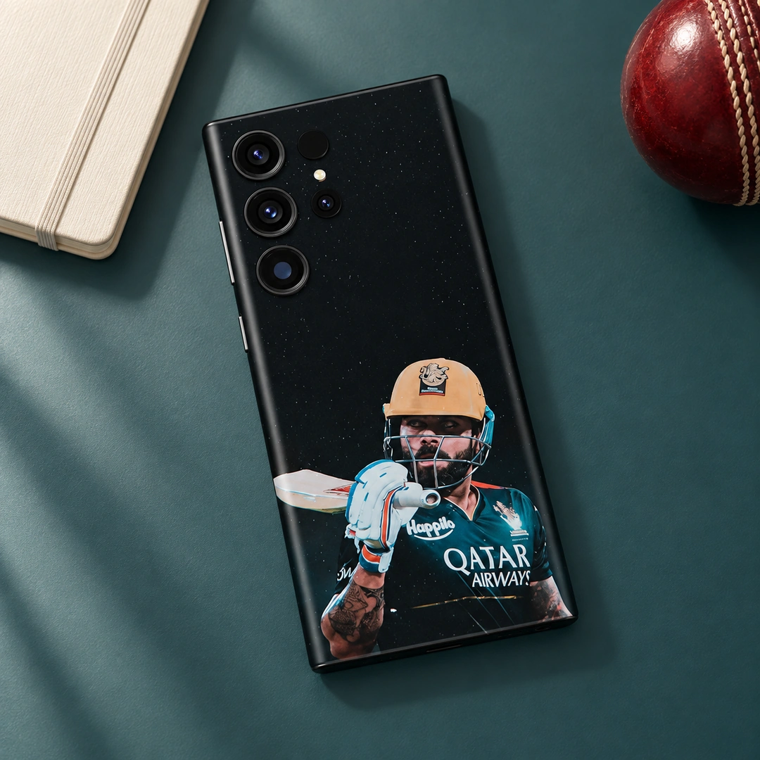 Virat Kohli Gold Helmet Mobile Skin - Teal Desk Flat Lay Virat Kohli mobile skin with gold helmet and bat portrait on black, teal desk flat lay