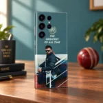 Virat Kohli photo phone skin with THE GREATEST OF ALL TIME quote, walnut cricket desk