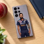 Virat Kohli India jersey portrait mobile skin on grey, oak desk flat lay
