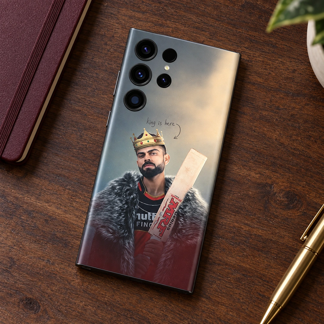 Virat Kohli King Photo Mobile Skin - Walnut Desk Crowned Virat Kohli phone skin lying on a walnut desk