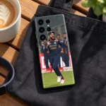 Virat Kohli navy India kit celebration mobile skin in cafe lifestyle setting