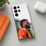 Virat Kohli photo mobile skin with orange shirt portrait and white upper design, minimal desk view