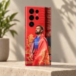 Virat Kohli RCB red flag photo mobile skin, three-quarter view on beige stone