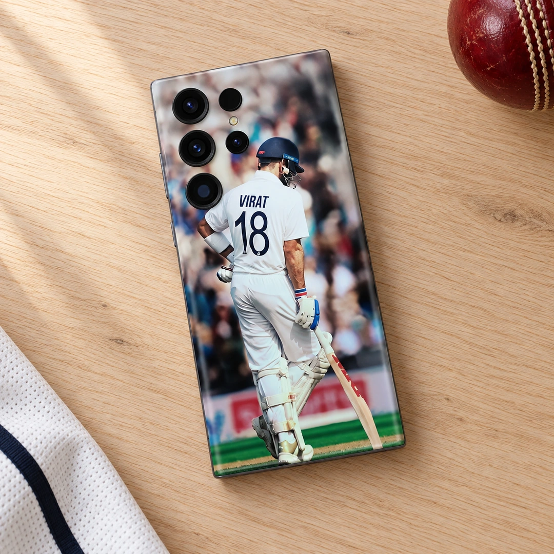Virat Kohli White Kit 18 Mobile Skin - Oak desk flat lay Virat Kohli photo mobile skin with VIRAT 18 on white cricket kit, oak desk flat lay