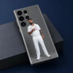Virat Kohli mobile skin with full-length white Test uniform portrait on grey, navy studio detail