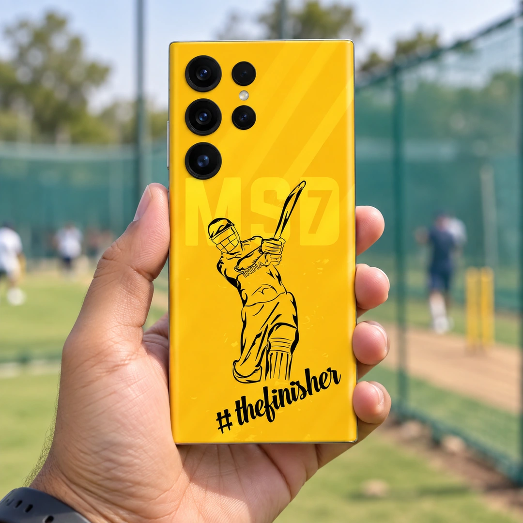 Dhoni Finisher Yellow Mobile Skin – practice nets handheld view Yellow Dhoni batting illustration mobile skin with thefinisher script, practice nets handheld view