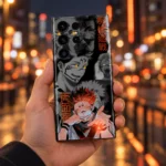 Sukuna mobile skin with gray manga collage and orange Japanese lettering, city night handheld view