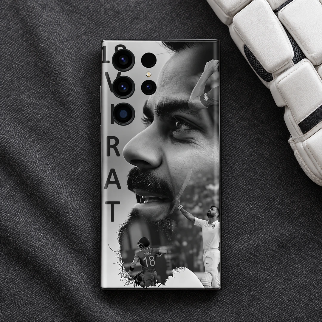 18 Virat Kohli Monochrome Mobile Skin – fabric flat lay Virat Kohli monochrome collage mobile skin on dark fabric beside a white cricket glove