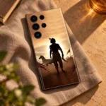 Krishna silhouette mobile skin with sunset artwork on warm taupe linen in an overhead flat lay