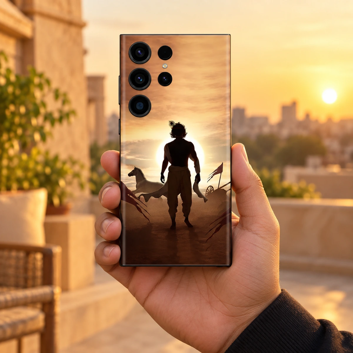 Krishna Sunset Mobile Skin - handheld Krishna Sunset Silhouette Mobile Skin held in hand on a terrace at golden hour