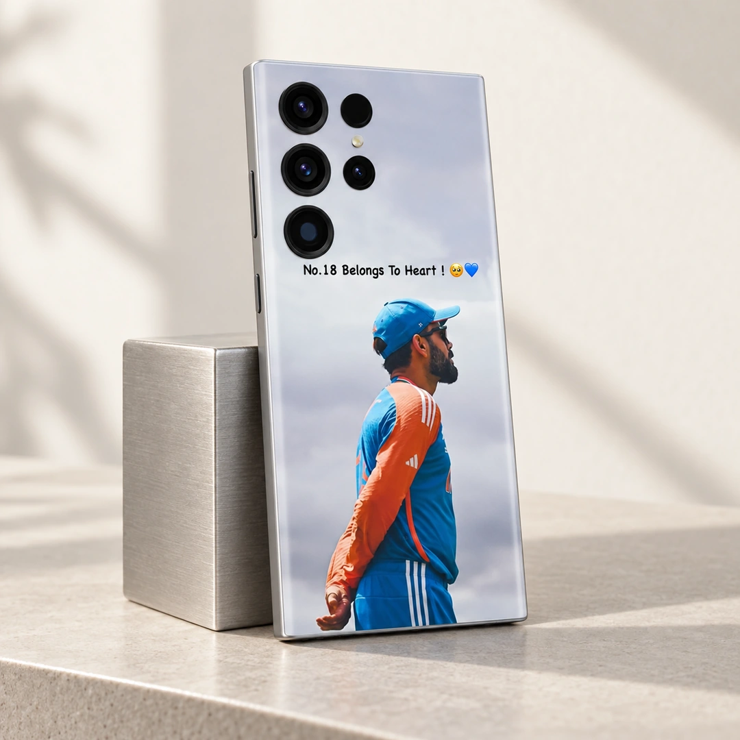 Virat Kohli No.18 Belongs To Heart Mobile Skin - silver display stand Virat Kohli mobile skin with No.18 Belongs To Heart message and blue-orange training portrait, silver display stand