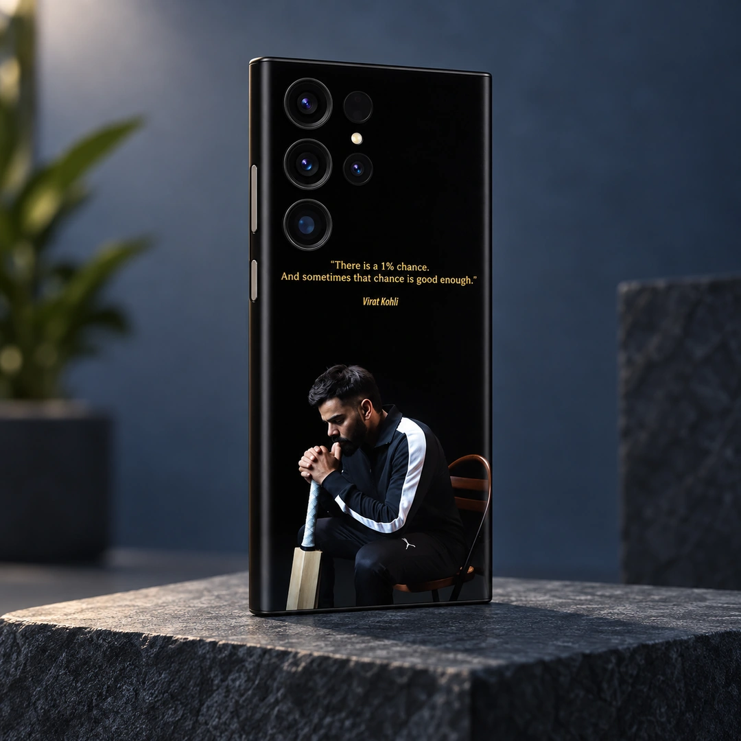 Virat Kohli 1% Chance Quote Mobile Skin - Slate Studio Angle Black Virat Kohli mobile skin with gold 1% chance quote and seated portrait, slate studio angle