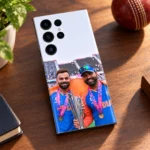 Virat Kohli and Rohit Sharma trophy photo mobile skin with blue India jerseys, walnut desk lifestyle