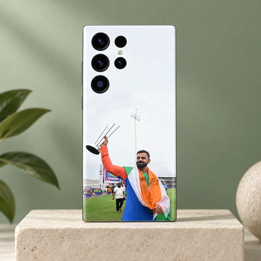 Virat Kohli Tricolour Trophy Mobile Skin - Sage studio portrait Virat Kohli raising a silver trophy while draped in the Indian tricolour on a mobile skin, sage studio portrait