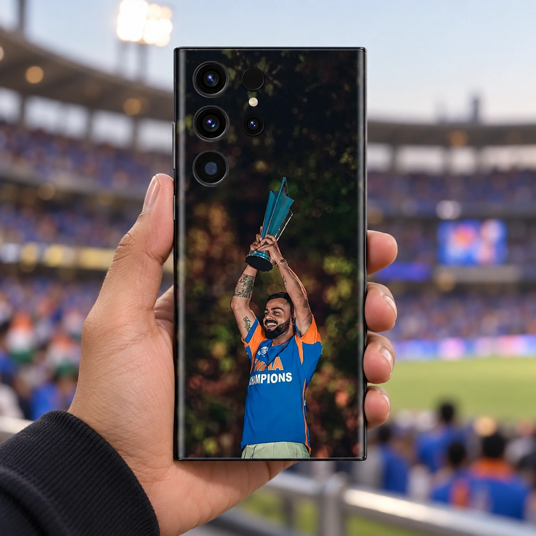 Virat Kohli Trophy Celebration Mobile Skin – Handheld Stadium View Virat Kohli trophy celebration photo mobile skin with blue and orange shirt, handheld stadium view